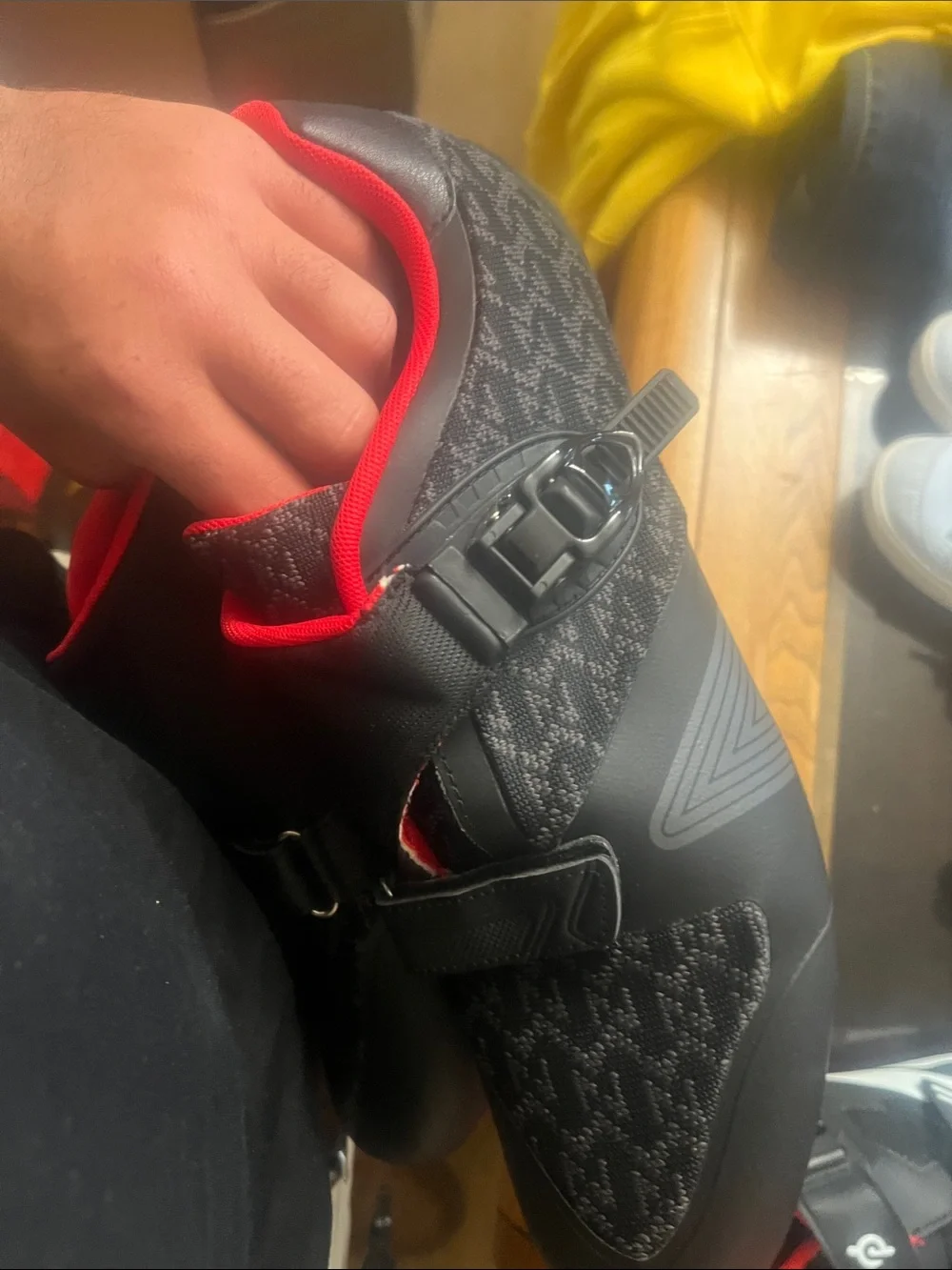 Black Cycling Shoe with Red Interior and Ratchet Closure